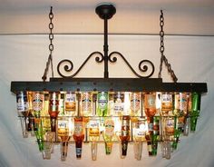 a chandelier made out of beer bottles is featured on pinterest's page