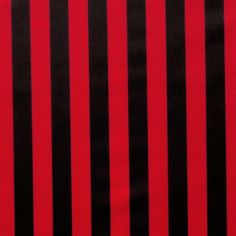 a red and black striped wallpaper with vertical lines