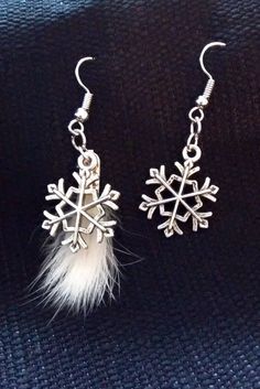 "For winter lovers : lovely snowflakes earrings with genuine rabbit fur. Handmade earrings inspired by Canada's majestic nature and wildlife. Pendant: - Total length 1 \"3/16 (3 cm) - Width 1 \"(1.5 cm) The length of the fur may be slightly different from the example in the picture. Design made with recylcled fur from Quebec, Canada. Delivery: 2-4 business days (Canada) 6-10 business days  (US) 6-10 business days (international) Express delivery available, don't hesitate to ask for your last min Fur Earrings, Minimalist Earrings Silver, Snow Earrings, Majestic Nature, Winter Lovers, Snowflake Jewelry, Suede Bracelet, Winter Earrings, Essential Oil Necklace Diffuser