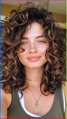 Keep your curls bouncy and beautiful with these 30 medium curly hairstyles that blend style and comfort, perfect for any occasion. Layered Curly Hair Medium Length, Hairstyle Medium Curly Hair, Medium Length 3b Curly Hair, Braided Hairstyles Middle Part, Medium Length Curly Haircut With Layers, Curly Hairstyles Round Face, Medium Length Curly Haircuts, Curly Medium Length Hair, Curly Hairstyles Women