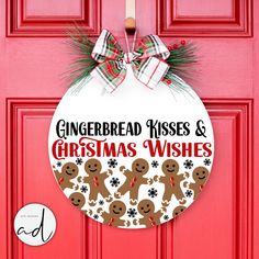 a gingerbread kisses and christmas wishes door hanger on a red door with the words gingerbread kisses and christmas wishes