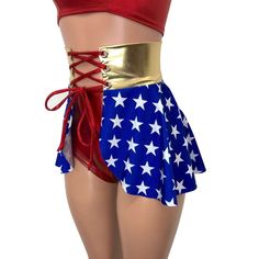 Our newest skirt style! We are in love with this lace-up, open-front mini skirt in Wonder Woman stars print with metallic gold waistband and red metallic ties on the corset waistband. The tie-up front offers an adjustable fit and the skirt is a single layer. Woman Costume Ideas, Open Front Skirt, Wrestling Outfits, Woman Costume, Corset Skirt, Wonder Woman Costume, Skirt Style, Rave Wear, Rave Outfits