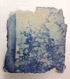 a piece of paper that has been altered to look like blue and white flowers on it