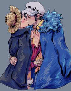 two people are kissing each other while wearing coats and hats with skulls on their heads