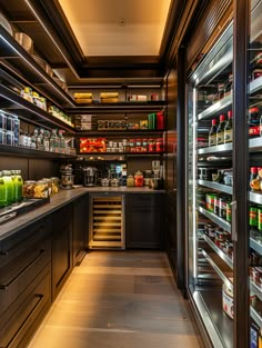 an empty pantry with lots of food and drinks on the shelves in front of it