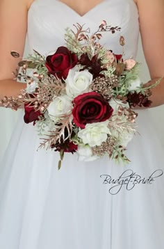 This is a round brides bouquet with burgundy and white roses, accented with rose gold foliage and delicate frosted greenery. All of our wedding bouquets are made with artificial wedding flowers. Ivory And Rose Gold Wedding, Sangria Wedding, Gold And Burgundy Wedding, Bridal Colors, Gold Wedding Flowers, Burgundy Wedding Flowers, Bouquet Burgundy, Diy Fleur, Wedding Flower Bouquets