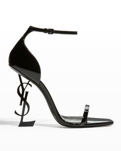 Get free shipping on Saint Laurent Opyum YSL Logo-Heel Sandals with Black Hardware at Neiman Marcus. Shop the latest luxury fashions from top designers. Luxury Shoes Heels Trendy, Luxury Heels For Work, Luxury Formal T-strap Sandals For Women, Luxury Elegant Heels, Luxury Heels For Prom, Elegant Luxury 4-inch Heels, Luxury Ankle Strap Heels, Drsigner Shoes, Luxury Formal T-strap Sandals With Single Toe Strap