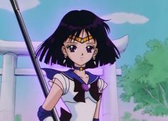 an anime character with long black hair holding a pole