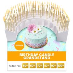 a birthday cake with sprinkles and a flower on top is displayed in front of a white background