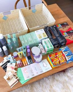 an assortment of cosmetics and beauty products on a table