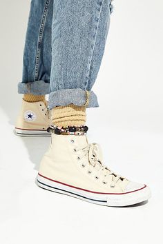 **Fit:** This style is in unisex sizing so a men's size 4 is a women's size 6.Classic canvas high top Chuck Taylors. High Top Converse Outfit, Beige Converse, Hi Top Converse, Shoes Sneakers High Tops, High Top Chucks, Cute Converse, White High Tops, Converse Sneakers, Hi Top