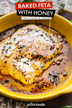 baked feta with honey in a yellow bowl