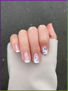 Halloween white tip nails with a ghost and mummy Halloween Nail Designs With Ghosts, Halloween White Tip Nails, White Mummy Nails, Ghost French Tip Nails Square, Easy Ghost Nails Diy, Ghost Square Nails, French Tip With Ghost Nails, Mummy Ghost Nails, French Nails With Ghost