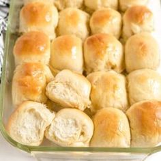 a casserole dish filled with bread rolls