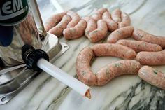 the sausages are being cooked on the counter