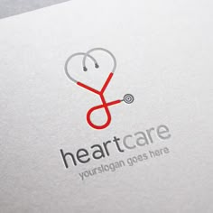 heart care logo with stethoscope on it