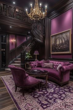 a living room filled with furniture and a chandelier hanging from the ceiling over a purple rug