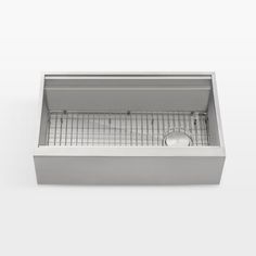 a stainless steel kitchen sink with grids on the bottom