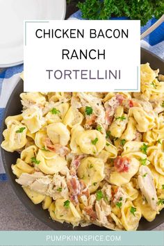 chicken bacon ranch tortellini in a skillet with parsley on the side