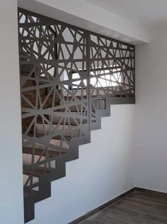 a stair case in the corner of a room