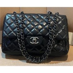 Authenticated Chanel Classic Bag Patent Leather Cc Logo Hardware Jumbo Silver Blackish Handle Bag Is In Good Condition Comes With Code Comes With Dust Bag Condition Is Good Pre Owned Expect Signs Of Wear No Odor No Card No Envelope No Dust Bag H 8 W 1.25 D 4 Single Flap Chanel Bag Classic, Classic Bags, Chanel Bag, Patent Leather, Black Silver, Chanel Classic, Dust Bag, Bag Lady, Chanel