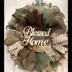 a wreath with the words, blessed home on it