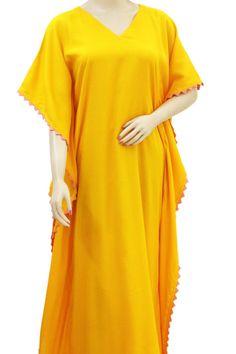 Floor length Yellow  Kaftan dress is made in Lightweight/ Soft feel Rayon fabric. Is is designed with 3/4 Sleeves, a V-neck with triangular lace work on Neck, Arms and waist. Perfect for comfortable evenings , girls Night, Lady night! Also a comfortable maternity wear. Measurement:  One Size  ( bust 40 inches, length 46) , for sizes XS to M                             One Plus Size  ( bust 56 inches, length 46) , for sizes L to XXL                             Care: Cold wash & tumble dry Note: P Flowy Festive Maxi Dress, Flowy Yellow Tunic Maxi Dress, Flowy Long Maxi Dress With Lace Trim, Cotton Maxi Dress For Festive Occasions, Yellow Maxi Length Kaftan For Spring, Yellow Flowy Long Maxi Dress, Flowy Yellow Long Maxi Dress, Full-length Beach Dresses, Yellow Floor-length Gown For Summer