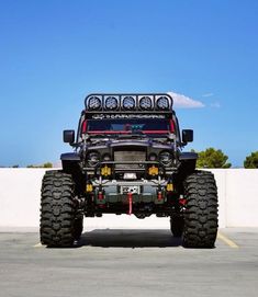 the front end of a jeep with four tires