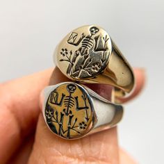 Memento Mori Signet – Digby & Iona Memento Mori Signet Ring, Silver Brass Jewelry With Engraving Option, Antique Oxidized Finish Engraved Ring As Gift, Minimalist Oxidized Signet Ring As Gift, Minimalist Oxidized Finish Signet Ring As A Gift, Vintage Oxidized Signet Ring For Gift, Antique Oxidized Finish Signet Ring As Gift, Antique Oxidized Finish Signet Ring For Gift, Gold Sterling Silver Ring With Oxidized Finish