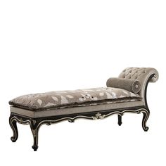 an ornate chaise lounge is upholstered with silver fabric and black wood trim