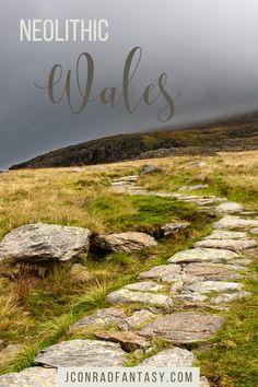 a stone path leading to the top of a hill with text overlay that reads neolitic wales