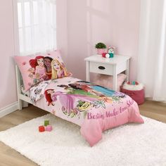 The Disney Princesses share the magic of friendship in this 4 piece toddler bed set! Featuring Ariel, Tiana, Moana, Jasmine, and Cinderella on a soft pink background, surrounded by flowers in shades of pink, green, turquoise and white. The 4-piece set includes a 42" x 57" printed comforter, fitted sheet with fully elasticized edges, flat top sheet, and a reversible pillowcase. Sheets have an allover print design, featuring the Princesses and flowers, all on a crisp white background. Fit a standa Princess Toddler Bed, Disney Princess Bedding, Toddler Bed Girl, Disney Princess Toddler, The Disney Princesses, Toddler Sheets, Toddler Bed Set, Toddler Pillow, Toddler Mattress