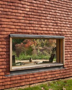 a brick building with a large window on the side