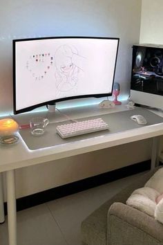 a desk with a computer monitor, keyboard and mouse sitting on it's side