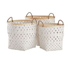 three white woven baskets with handles