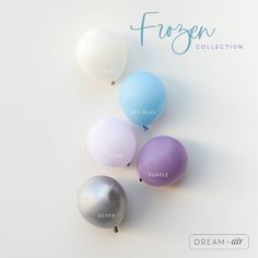 five balloons with different colors are shown in the foreground and on the right side