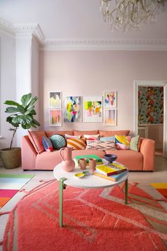 a living room filled with lots of colorful furniture