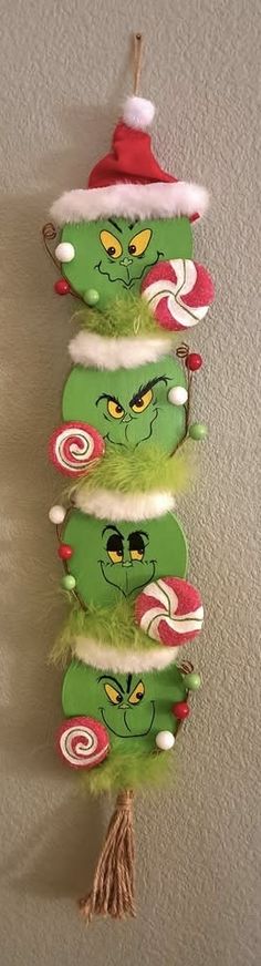 the grinch hat is hanging on the wall