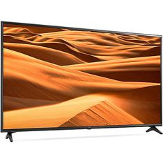 an image of a television screen with sand dunes in the background