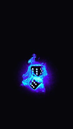 a black background with blue flames and a dice