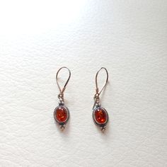 Genuine Amber Earrings Silver Wire Never Worn Gem Earrings, Amber Earrings, Orange Brown, Brown Orange, Earrings Silver, Silver Wire, Silver Color, Silver Earrings, 925 Silver