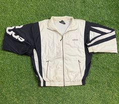 Vintage Adidas Jacket Good Vintage Condition Made in Taiwan Each Vintage item is unique and fits differently. Please refer to measurements for the best fit.  Size Small  Width 23 in  Length 26 in * I ship all items in two or three business days and utilize Priority Mail options via USPS. Expedited shipping is available upon request. If you have any questions; Please Ask! *I Ship International!! PLEASE EMAIL BEFORE PURCHASING INTERNATIONALLY * All of my items are pre-owned and, unfortunately, som Adidas Vintage Jacket, Light Rain Jacket, 90s Sports, Adidas Windbreaker, Adidas Vintage, Tracksuit Jacket, Light Rain, All Sports, Vintage Adidas