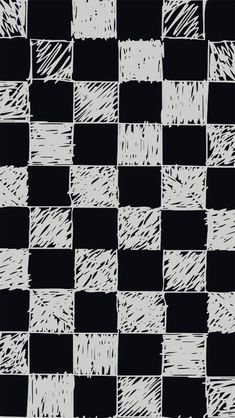 a black and white checkerboard pattern that has been drawn with chalk on it