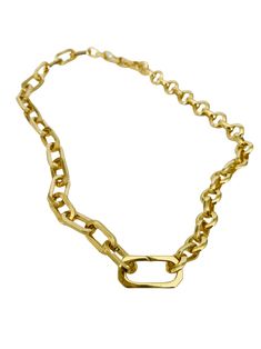 This versatile necklace offers three different looks in one stunning piece of jewelry. Crafted with a combination of two gold chains, including a gold paper clip chain and round rolo chain, it is finished with a connector clasps. The necklace measures approximately 17 inches in length and can be rotated to achieve three distinct styles. In the first look, you can showcase the bold statement necklace by wearing it with the gold paper clip chain prominently displayed. The unique and contemporary d Asymmetrical Necklace, Bold Statement Necklaces, Gold Statement Necklace, Gold Paper, Rolo Chain, Gold Chain Necklace, Touch Of Modern, Paper Clip, First Look