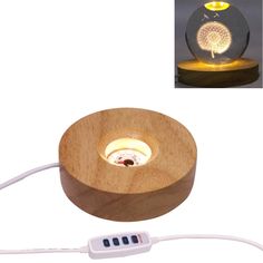 a light that is on top of a wooden object with a cord attached to it