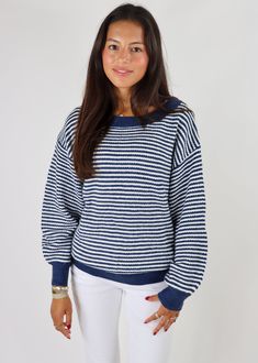 We are loving this striped sweater! The soft knit fabric ensures comfort, while the unique sleeve design adds a trendy touch to your everyday look! Pair it with your favorite jeans or a skirt for an effortlessly chic outfit that stands out in any setting. The Details Striped Pattern Sweater Lantern Sleeves Oversized Fit 65% Acrylic 35% Polyamide [#other] Lay flat to dry Do not machine dry Hand wash cold [/other] Blue White Sweater Outfit, White Sweater Outfit, Going Out Skirts, Pumpkin Patch Outfit, Striped Knitted Sweater, Mini Skirt Dress, Effortlessly Chic Outfits, Casual Day Outfits, Flare Leg Jeans