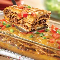 a casserole dish filled with meat and vegetables