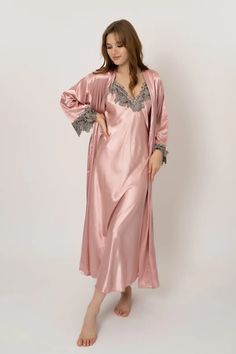 Lightweight and breathable, these soft satin nightgowns make the perfect loungewear for women who love to sleep in style. They're ideal for those who enjoy a more feminine sleepwear look and feel. Oblique V-Neck Long Robe with Lace 3/4 sleeve Fabric strings on the inside to hold the robe together and a removable belt t Feminine Sleepwear, Fashion Dress Up Games, Satin Sleepwear, Straight Clothes, Bandage Midi Dress, Silk Lingerie, Pink Fits, Half Skirt, Women's Nightgowns