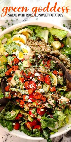 a salad with tomatoes, lettuce and other vegetables