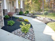 a house with landscaping in the front yard